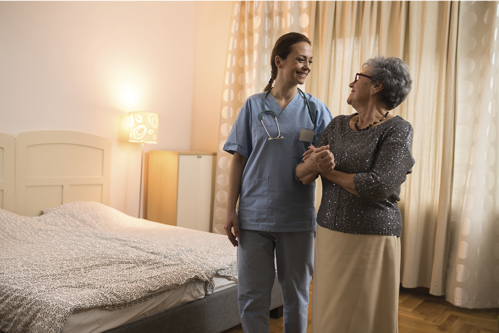 patient with provider in bedroom