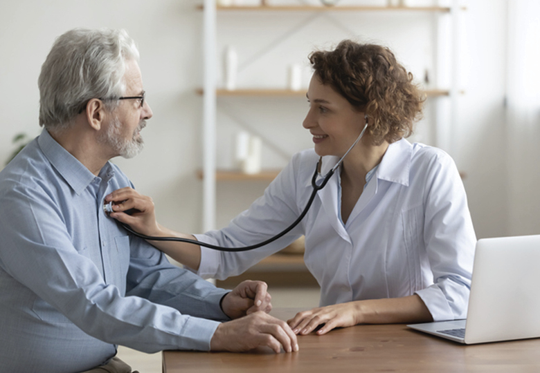 clinician listening to patients heart