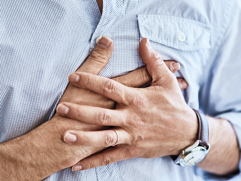 person holding their heart