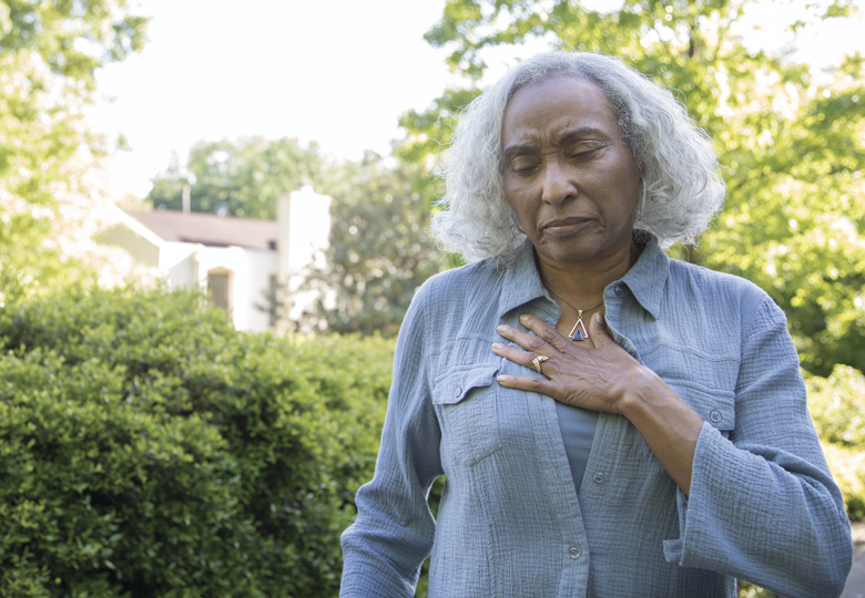 person holding their heart