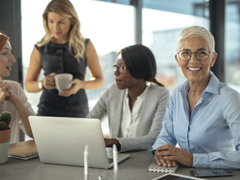 Corporate OlderWomanwithGlass 3womenoncomputercoffee3 480