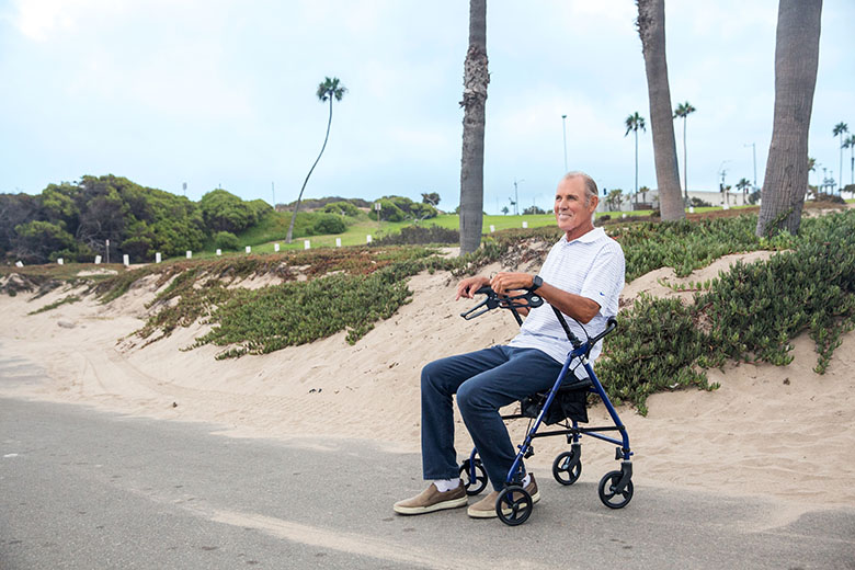 DME WhiteMale SittingOnBeach DriveRollator2