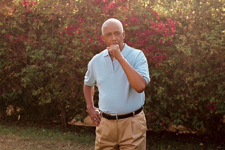 DiseaseManagement BlackMale Coughing Outside web flip