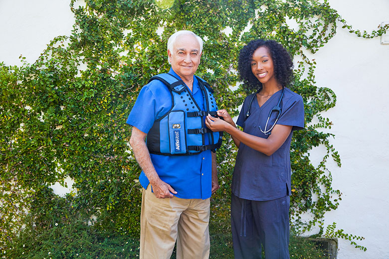 HFCWO ClinicianHelpingMaleWithTactileMedical2