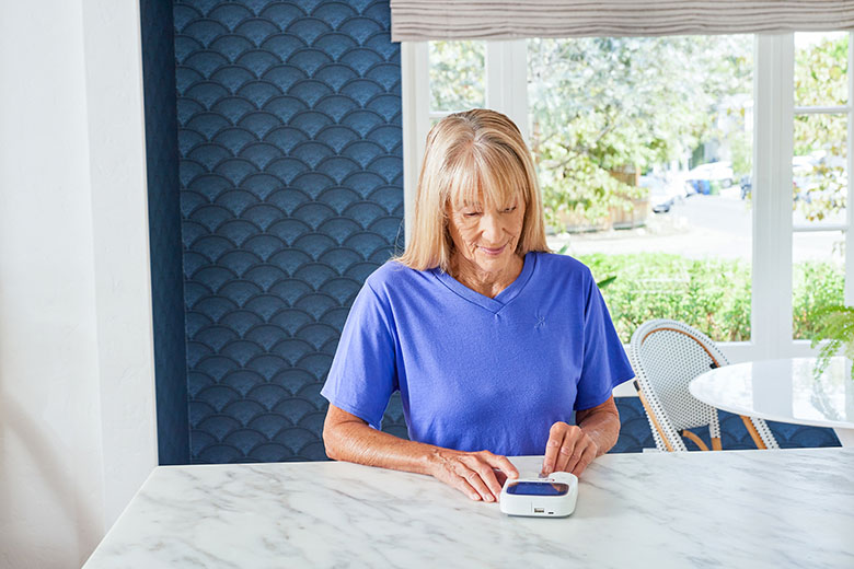 INR OlderWhiteWoman Kitchen CoagSense