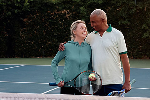 Lifestyle CoupleHugging Tennis