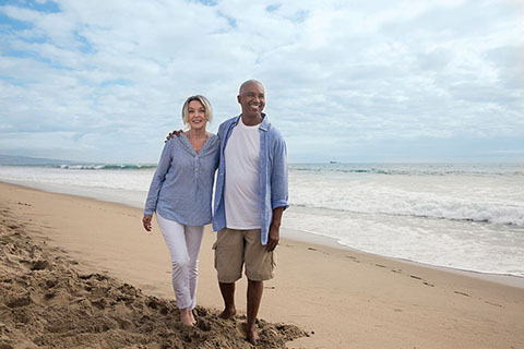 Lifestyle WhiteFemaleBlackMale Beach WalkingAlongtheBeach