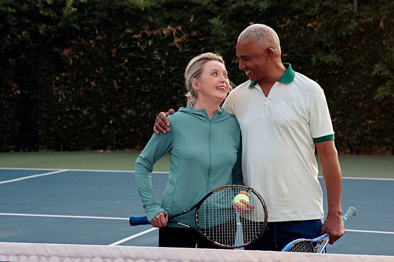 Lifestyle CoupleHugging Tennis