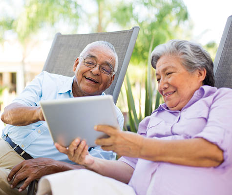 older couple looking at tablet