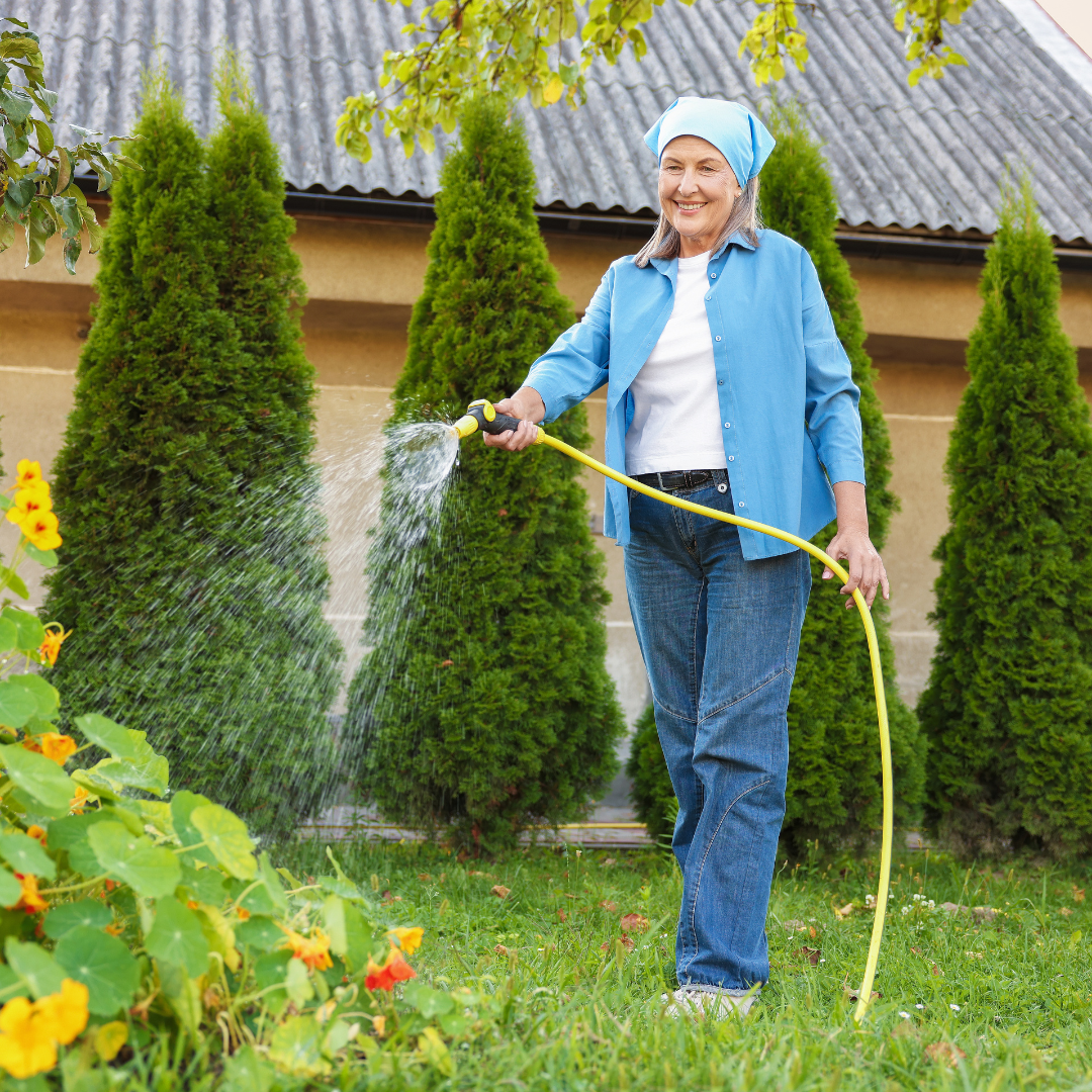woman watering her garden