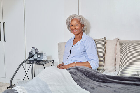Sleep Apnea Black Older Female in Bed ResMed2